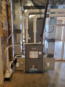 lennox heating and cooling unit in basement